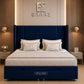 tall navy blue upholstered headboard and matching storage base