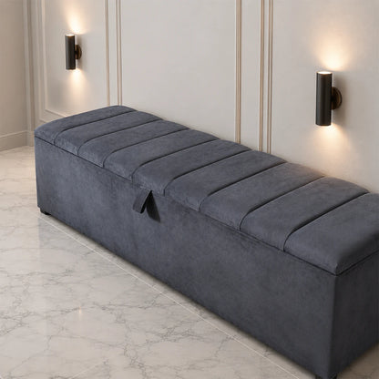 Dark grey upholstered ottoman storage box with lift-up lid