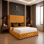 Modern bedroom with a tufted blue Midnight Columbus bed and decorative wall logo.