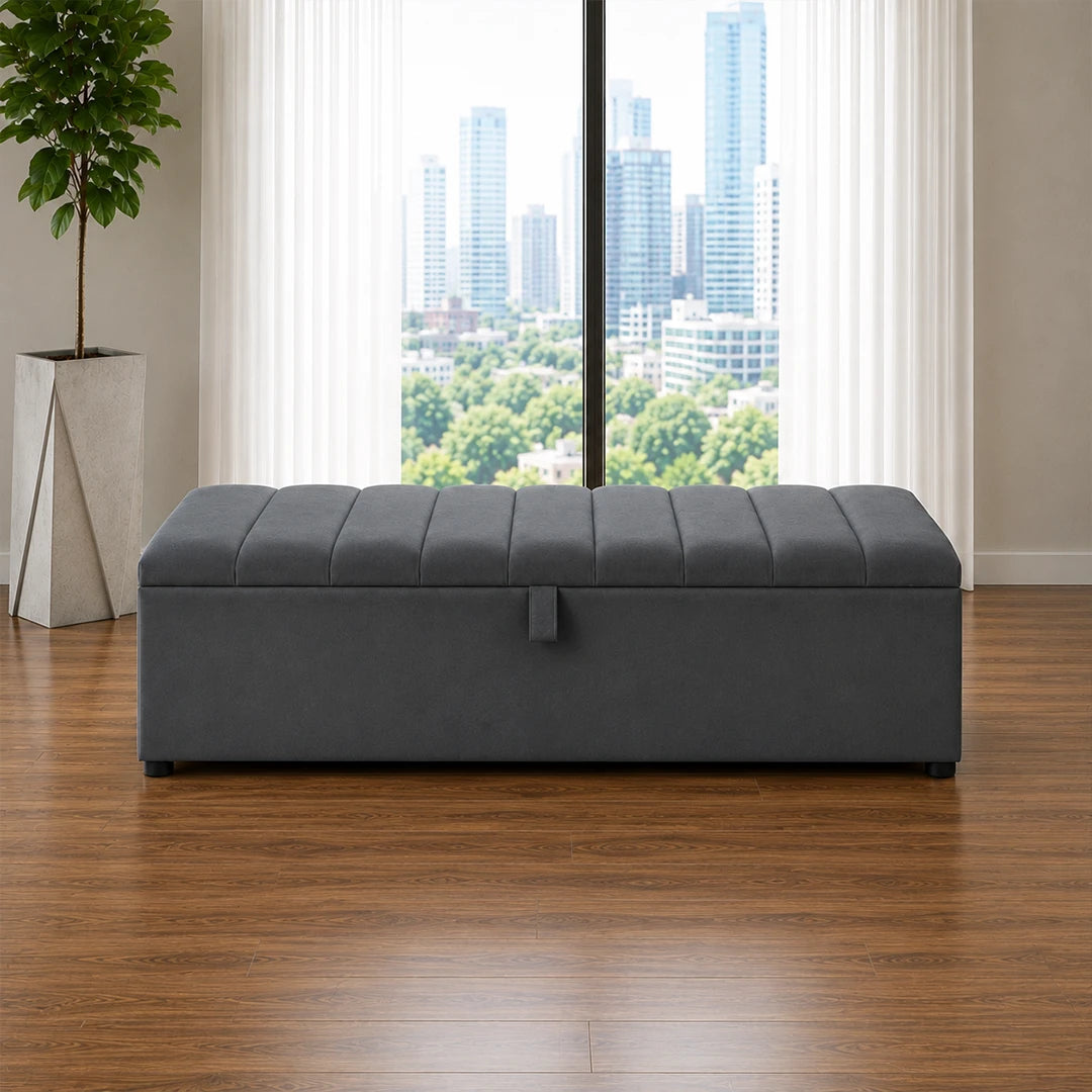 Dark grey upholstered ottoman storage box with lift-up lid