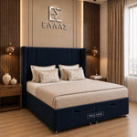 tall navy blue upholstered headboard and matching storage base