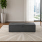 Dark grey upholstered ottoman storage box with lift-up lid