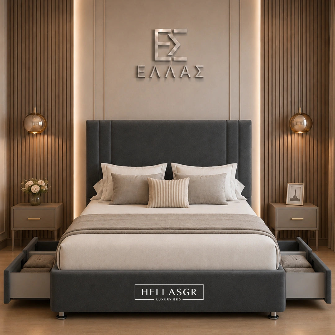 A dark gray upholstered bed frame with a tall padded headboard and matching footboard, styled in a modern bedroom. The bed is dressed in white and sage green bedding, with the brand name 'HELLASGR' visible on the footboard and wall.