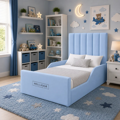 A light blue upholstered children's bed with a tall channel-tufted headboard and matching footboard