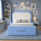 A light blue and white children's bed frame with a padded headboard and footboard