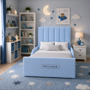 A light blue upholstered children's bed with a tall channel-tufted headboard and matching footboard