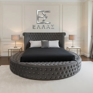 Round tufted Diamond Orbit bed in a stylish bedroom. 