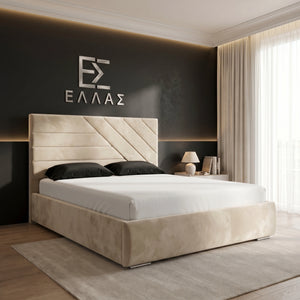 Modern bedroom with a beige Geo Ottoman bed and headboard, featuring a brand logo on the wall.