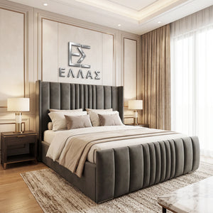 Modern bedroom with a gray upholstered Mikonos Storage bed and decorative elements.