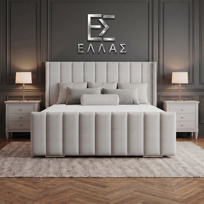 Gray upholstered Newyork Wingback bed in a bedroom setting with 'ELLEA' logo on the wall.