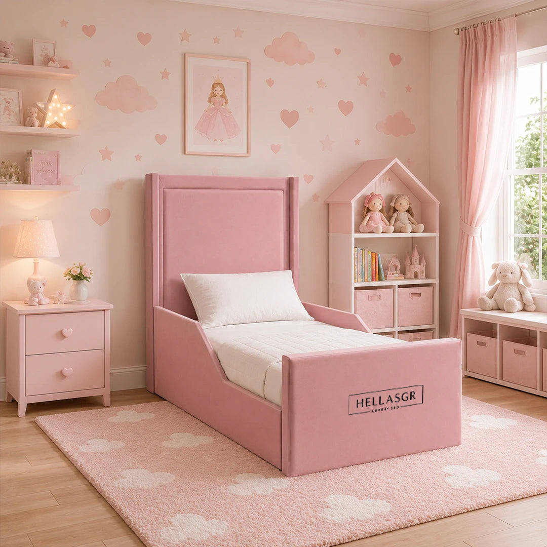 A pink children's bed with a high upholstered headboard and footboard