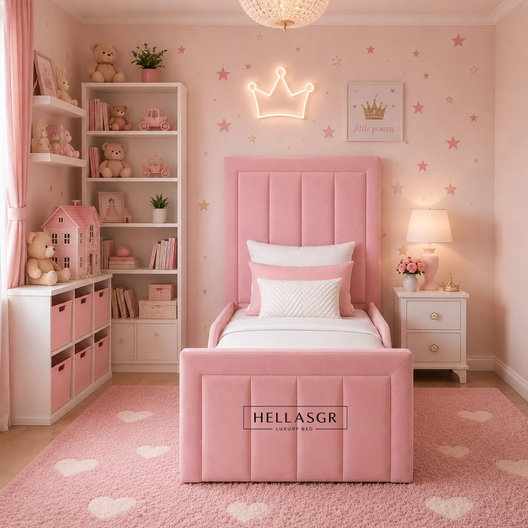A pink upholstered single bed with a padded headboard and footboard