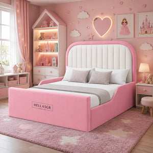 Pink and white upholstered bed frame in a whimsical pink children's bedroom. The bed features a tall rounded headboard,