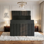 Modern black Verto TV bed with tufted design in a stylish bedroom setting.