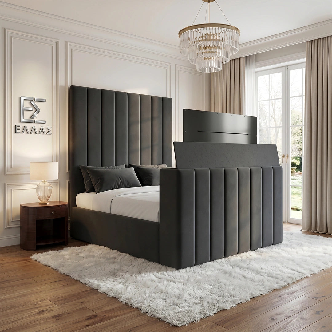 Modern bedroom with a large gray upholstered Verto TV  bed, nightstand, and chandelier.