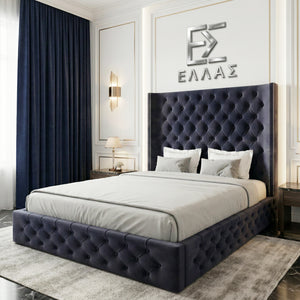 Modern bedroom with a black tufted Midnight Columbus bed and decorative wall art.